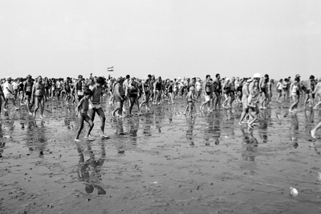 Crowds having fun at the beach near Buesum, Germany 1960s