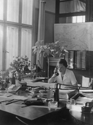 Woman in office, 1938 (b/w photo)