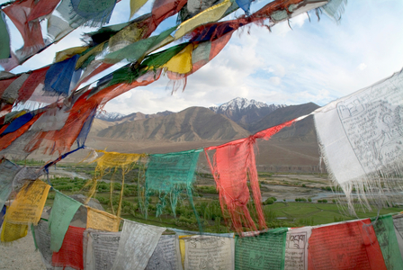 Tibetan Buddhist prayer flags above the Indus Valley (photo)