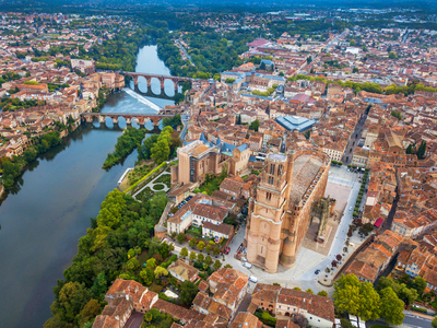 Gothic Saint Cecile Cathedral in Albi town, Pont Vieux bridge and the Church of Notre Dame du Breuil in Tarn village, Languedoc-Roussillon Occitanie Midi Pyrenees France, 2020 (photo)
