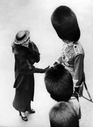 Queen Elizabeth welcomes an officer, 1937 (b/w photo)