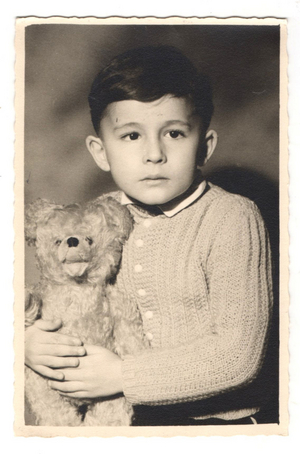 Little boy with his bear around 1960