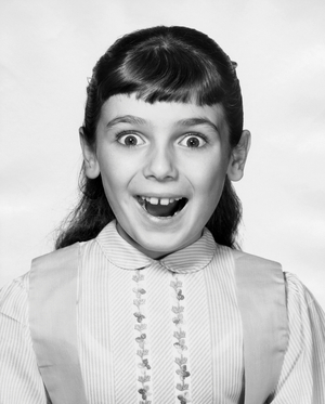 Portrait of girl looking surprised