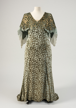 Ivy-leaf design dress worn by Queen Mary to the wedding of Princess Elizabeth and Lieutenant Phillip Mountbatten on 20th November 1947 (gold lame & cut velvet)