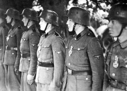 Decoration of soldiers of the SS Division 'Hitler Youth', 1944 (b/w photo)