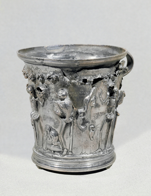 Mask of a satyr on a piedestal, Archilokos of Myrina playing the lyre …