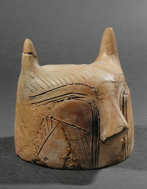 Cat-like, zoomorphic head (terracotta)