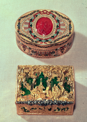 Top: Gold snuffbox inlaid with various stones with a cornelian cameo in the centre with amorini, possibly by J. C. Neuber of Dresden. Bottom: Gold snuffbox with groups of figures amid rococo scrollwork and flowers on a green translucent enamel background
