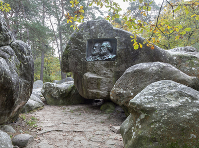 View of the Monument to Theodore Rousseau (1812-1867) and Jean Francois Millet (1814-1875), French painters, founders of the school of Barbizon, Sculpture in low relief by Henri Chapu (1833-1891), installed in Barbizon in the forest of Fontainebleau. Photography, KIM Youngtae, Barbizon, Seine and Marne, Ile de France.
