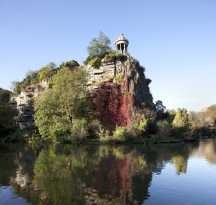 View of the monolith of the Parc des Buttes Chaumont, a public garden in Paris created in 1867 as part of the works of Haussmann under Napoleon III, designed by Jean Charles Alphand (1817-1891) on the site of the ancient gypsum quarries of which remains the crown monolith of a temple of Sibyl built by architect Gabriel Davioud (1824-1881). Photography, KIM Youngtae, Paris.