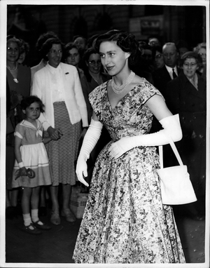 May 26, 1954 - Princess Margaret Attends Cocktail Party... H.R.H. Princess Margaret was the guest of honor at the Highland Light Infantry Regiment's Cocktail Party, at the United Services Club, Pall Mall... Keystone Photo Shows: Princess Margaret arrives for the party this evening