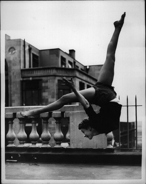May 05, 1954 - Meribeth Old Takes Over From Sally Barnes In West End Show: Photo shows Meribeth old the acrobatic dancer from the United States - a” no hands” somersault - during rehearsing on the roof of the Adelphi Theatre this afternoon - in readiness to take over from Sally Barnes in the A1 Read Show” You'll Be Lucky '