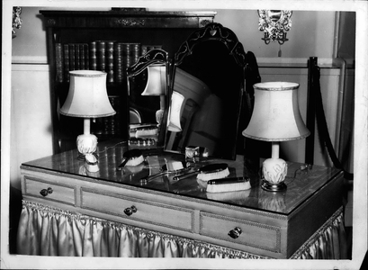 Apr. 04, 1953 - Coronation Year Gold Plate - For Export Only Dressing Table Set: A fine collection of Gold Plate - Specially designed for the Coronation Year and produced by Messrs. Asprey of New Bond Street - is to be seen in London.. Pot Shows An 187 ct. Gold Step pattern dressing table set - export price of which, 350.