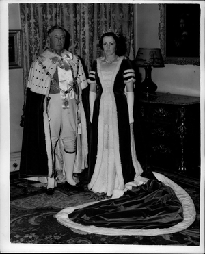 May 27, 1953 - Duke And Duchess Of Norfolk In Coronation Dresses: The man with the biggest job in Britain today, the master planner behind the Coronation preparations, the Earl Marshal, The Duke Of Norfolk, photographed with the Duchess Of Norfolk wearing their Coronation Day robes last night.