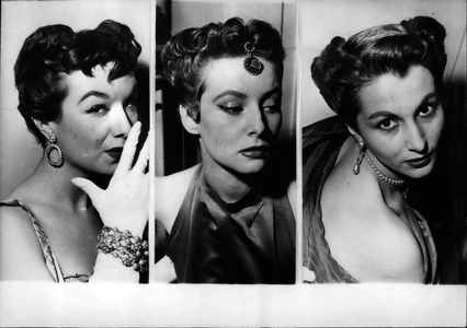 Jan. 01, 1954 - New Hairstyles displayed at Paris hairdressers show: Three charming mannequins display the” V Line” style. From left to right:” Life of Boheme”, Aquarius” and” Valenciennes'