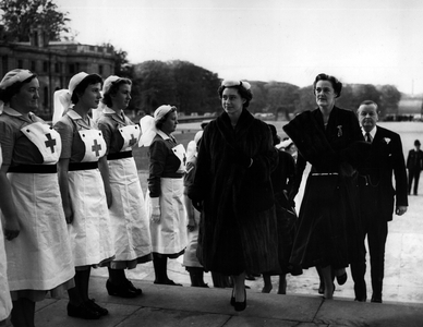 Nov. 11, 1954 - Dior puts Paris into Blenheim Palace fashion display in aid of the Red Cross: History and H-line made a pageant of contrasts when Dior displayed his modern fashions at Blenheim Palace, which was built as a gift to the Duke of Marlborough after his victory over the French at Blenheim in 1704. Sir Winston Churchill was born there and fashion paraded past the pictured of his ancestors. The display was organised by the Duke and Duchess of Marlborough on behalf of the British Red Cross, with Princess Margaret as guest of honour