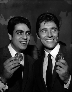 Apr. 04, 1966 - Enrico Macias (Left) And Sacha Distel Showing Their Medals, Awarded Prizes By Distributed By The Society Of Authors, Composers And Music Publishers