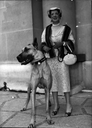 May 13, 1954 - La Belle et la Bete? Mrs. Paul Derval receives the award of? Honor? At the ambassadors' restaurant yesterday afternoon, safe? Is the gala? The Beauty And The Bete? the grand prize d? Honor went to Mrs. Paul Derval who came with a German mash (our photo) Keystone