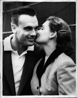 Jul 07, 1953 - Congratulations from his wife.. Seixas wins Men's Singles championship: Photo shows VIC Seixax of the United States receives a congratulatory kiss from his wife - after he had beaten Denmark's Kurt Neilson to win the Men's Singles Championship at Wimbledon this afternoon.