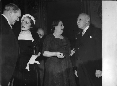 Feb. 08, 1954 - Saint-Laurent and his daughter Mrs. O'Donnell were the guests of President and Mrs. Coty at a Elysee Palace luncheon