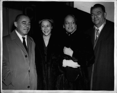 Oct. 15, 1953 - 15-10-53 Leaving for U.S.A. - Keystone Photo Shows: Mr. Richard Rodgers, composer of music for “” The King and I””, “” South Pacific””” etc. and his wife on left seen with Mr. Oscar Hammerstein 11 author of the same musical plays, and his wife on right photographed at Waterloo when they left on the Queen Mary boat-train for New York this morning.