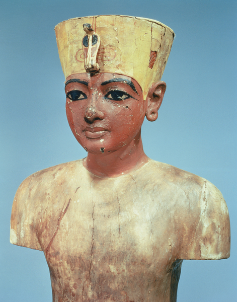 Image of 'Dummy' of the young Tutankhamun (c.1370-52 BC) wearing a compromise between the crown of the kings of Lower Egypt and the headdress of Nefertiti (painted & stuccoed wood), Egyptian 18th Dynasty (c.1567-1320 BC) / Egyptian, Egyptian National Museum, Cairo, Egypt, height: 76.2 cms, © Bridgeman Images