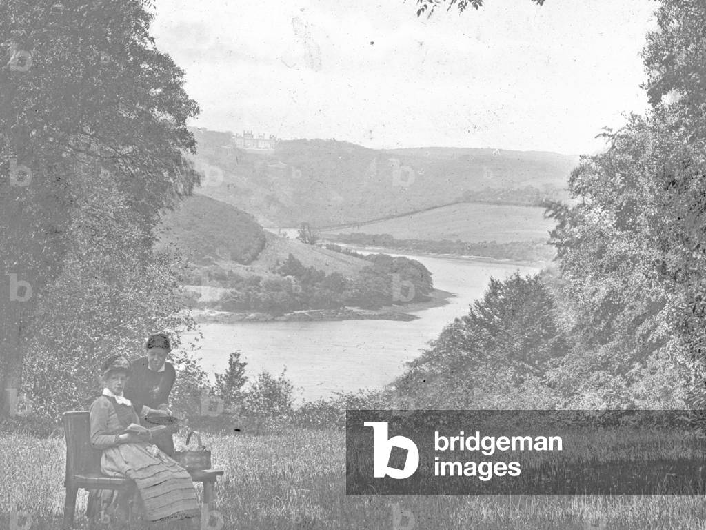 A view of two women (one seated),  in Cornwall, 1910s (b/w photo)