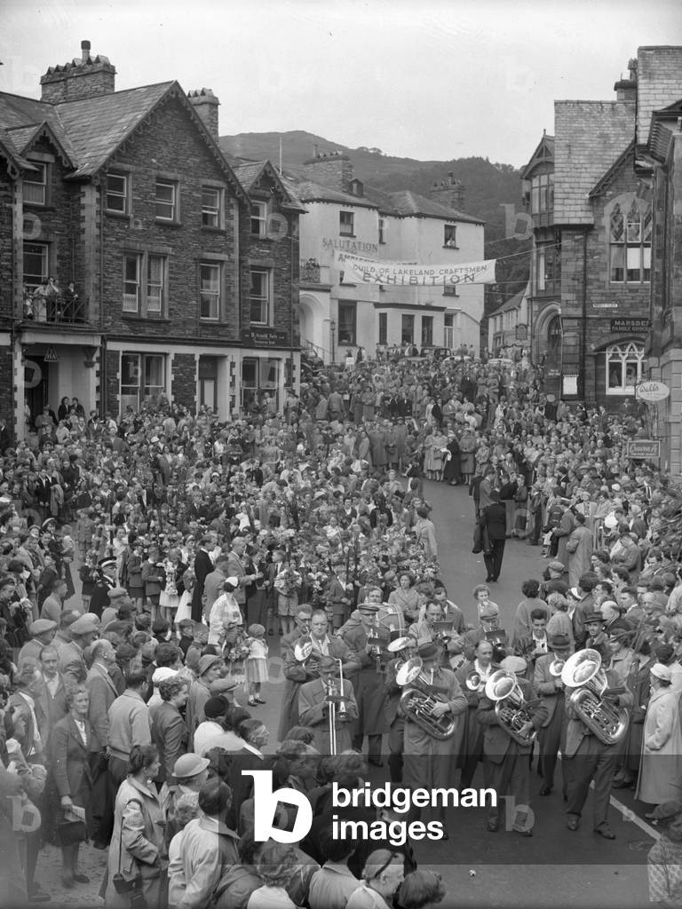 Crowds watching rushbearing festival at Ambleside, 1930s-60s (b/w photo)