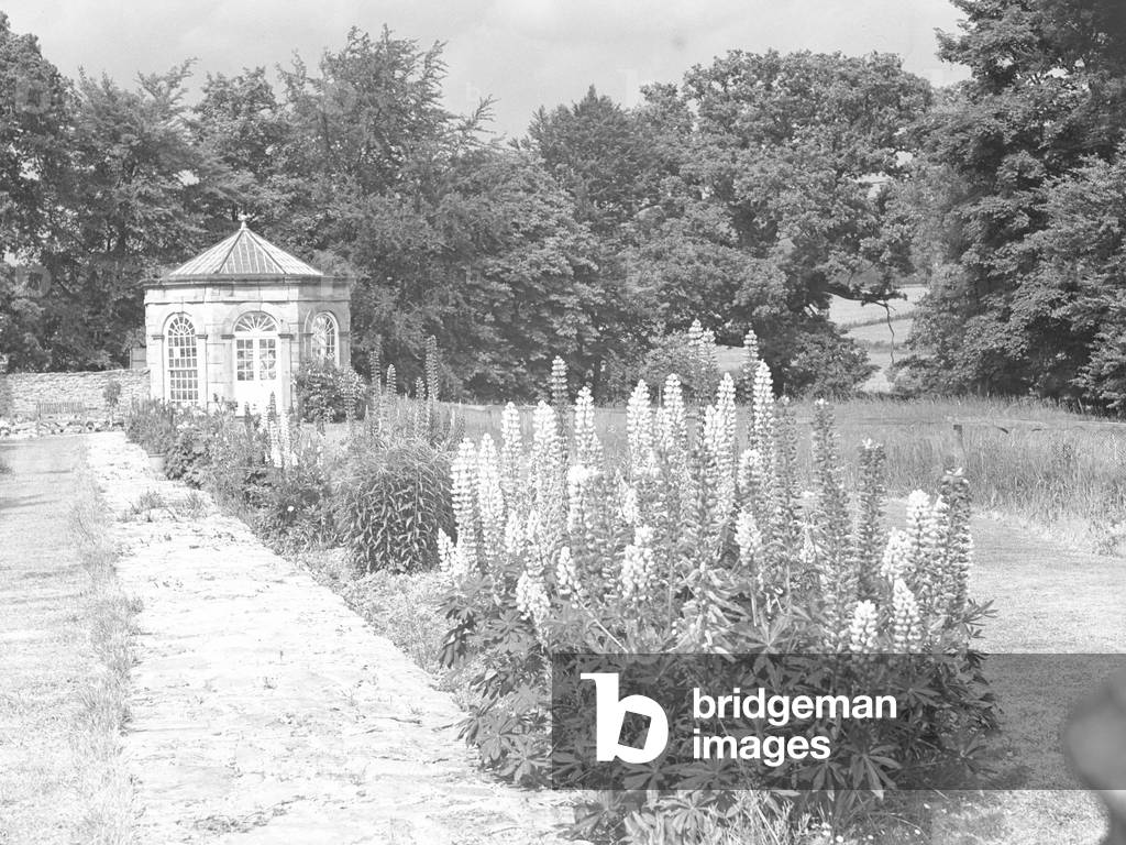 A view of the gardens at Burrow Hall including a small summer house , 1930s-60s (b/w photo)
