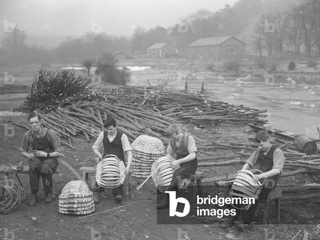 Basket makers at Backbarrow manufacturing spales baskets, 1930s-60s (b/w photo)