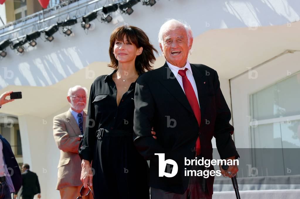 Italy, Venice: VENICE, ITALY - SEPTEMBER 08: Sophie Marceau and Jean Paul Belmondo attend the Golden Lion For Jean Paul Belmondo - 08/09/2016 Venezia, 73 Mostra Internazionale d'Arte Cinematografica. Red carpet Leone d'Oro alla careera 2016 to Jean-Paul Belmondo (Jean Paul) accompanied by Sophie Marceau