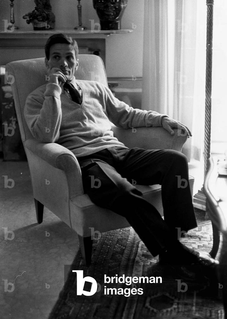23/05/1962 Rome, Pier Paolo Pasolini in his Home in Monteverde District (b/w photo)