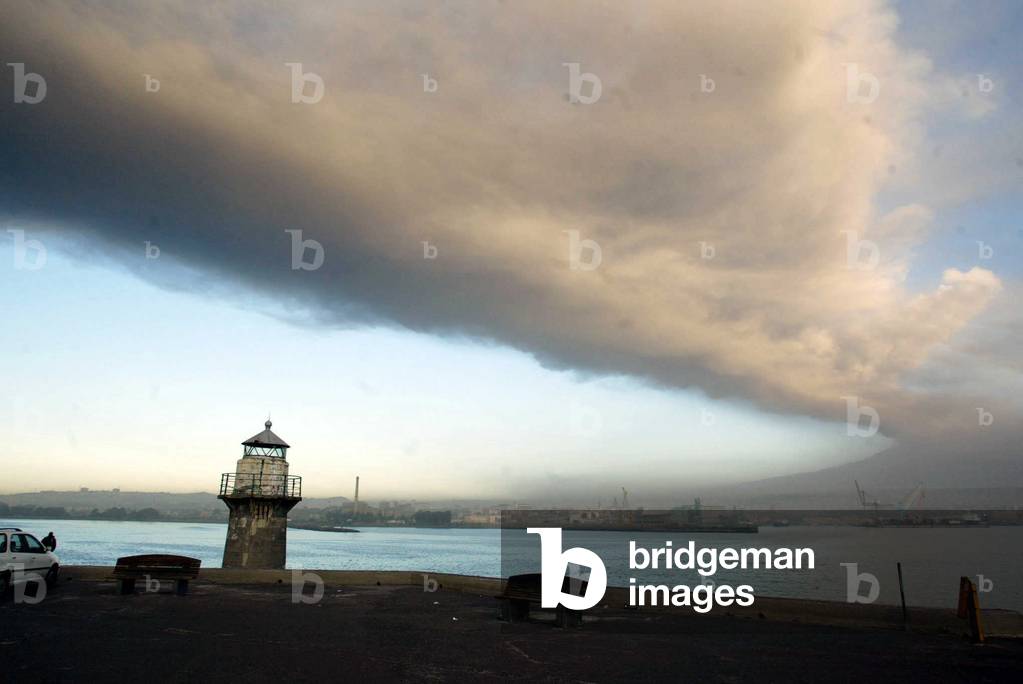 October 31, 2002, Mount Etna in Sicily. The cloud of volcanic dust seen from the port of Catania. Photo courtesy of