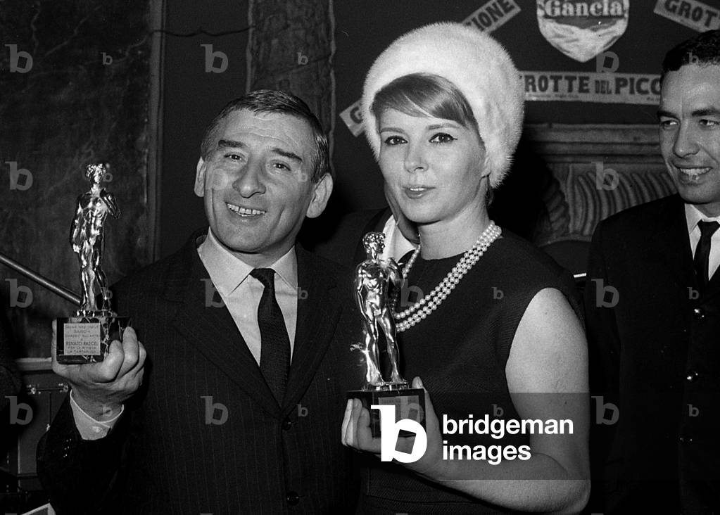 1964 About, Rome, Actor Renato Rascel And Actress Delia Scala Receive the Prize Oscar Gancia (b/w photo)