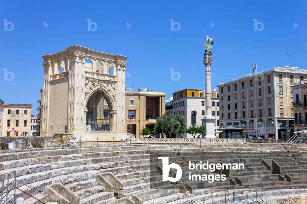 Italy, apulia, lecce, sant'oronzo square ,seggio san marco palace and detail of the roman theatre  (photo)