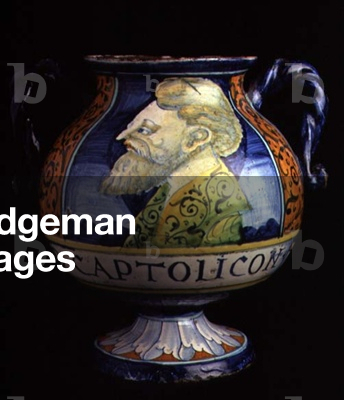 Maiolica two-handled pharmaceutical vase with a circular base and body decorated with a male portrait bust, stylised floral borders and text, Italian, made in Faenza, 16th century