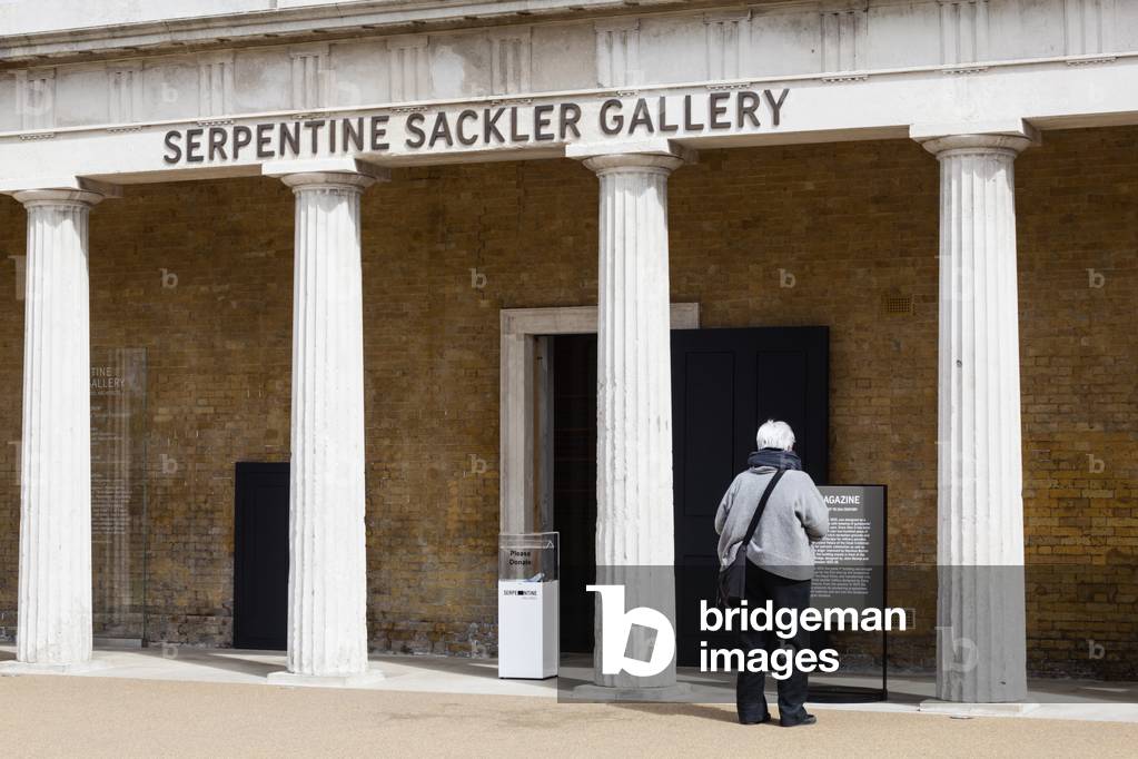 A visitor at the Serpentine Sackler Gallery, Kensington Gardens, London W2, UK (photo)
