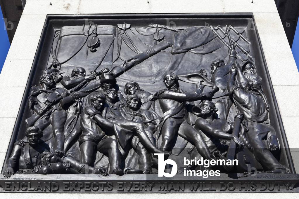 Bronze relief panel at the base of Nelson's Column depicting the death of Nelson at Trafalgar, Trafalgar Square, London, UK (photo)
