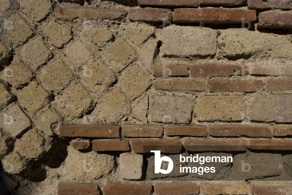 An example of opus reticulatum, at the Roman ruins of Pompeii, destroyed by Mt Vesuvius in AD79, Pompeii, Campania, Italy (photo)