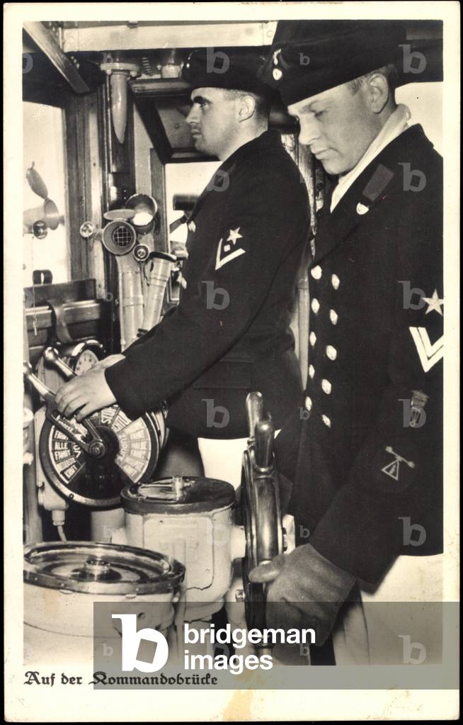 German sailors on the navigating bridge, steering wheel