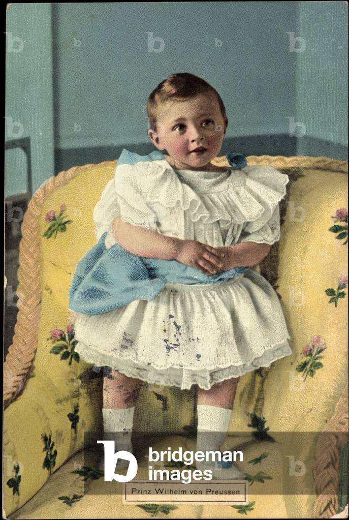 Prince William of Prussia standing on the chair