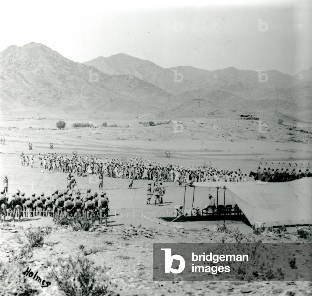 Jirga: British officials in desert setting with Indian troops and cavalry, Afghanistan, c. 1925 (photo)