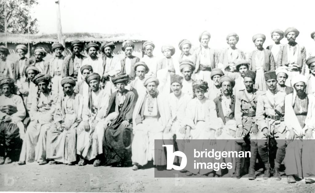 Assembly of chiefs, including Ahmed Beg (centre), South Kurdistan, Iraq, 1919 (b/w photo)