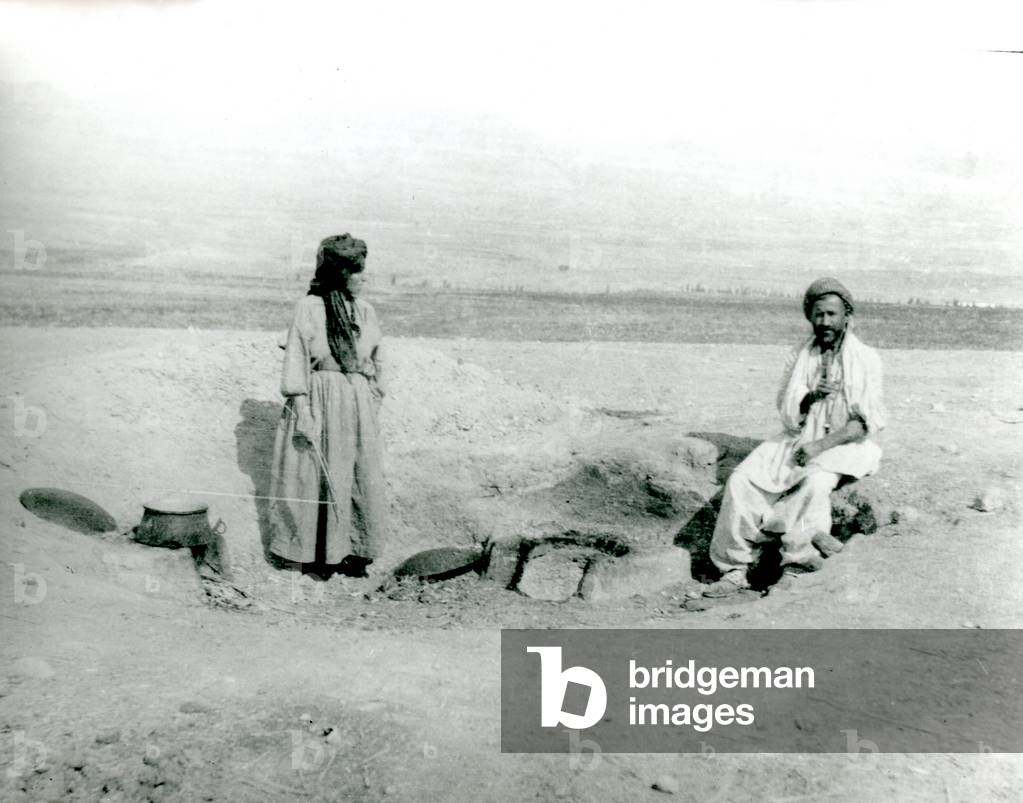 Kurds making bread on Mosul Plain (b/w photo)