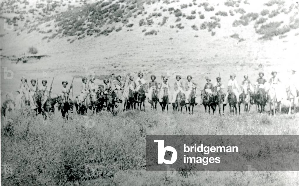 Armed riders, South Kurdistan, Iraq, 1919 (b/w photo)