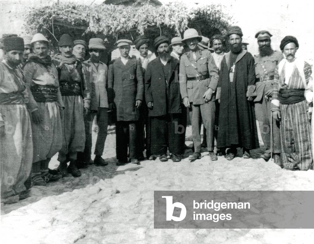 Assyrian chiefs at Dohuk, with Colonel Commandant Herbert Dobbin (b/w photo)