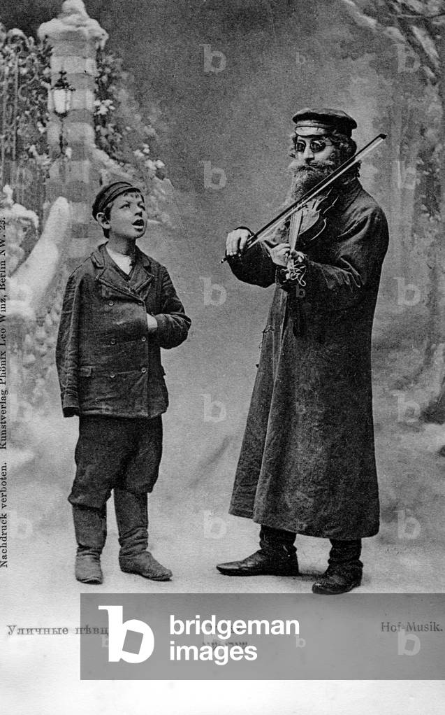 Jewish Musician with fiddle and boy singer