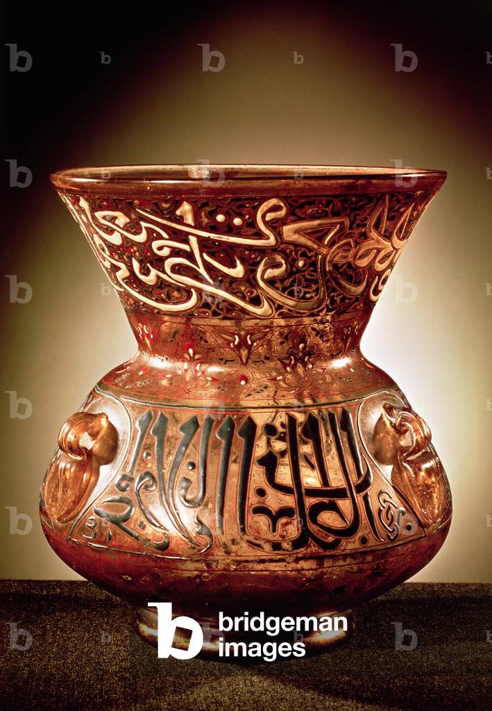 Mosque lamp with enamelled decoration inscribed with three quotations from the Koran and dedicated to Beybars II, early 14th century (glass)