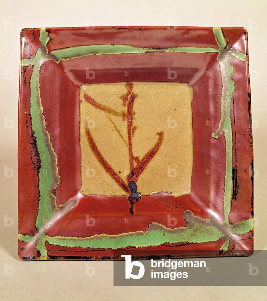 Piatto con glassa marrone e verde (gres)