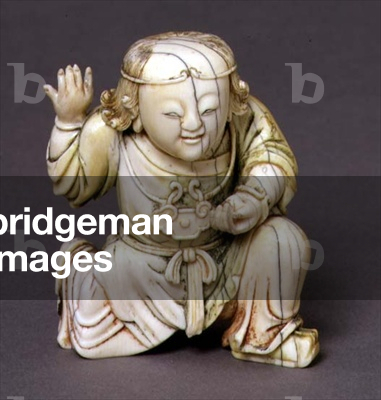 Carved figure of a man kneeling with traces of original pigment, possibly a support to another group or vessel (ivory)